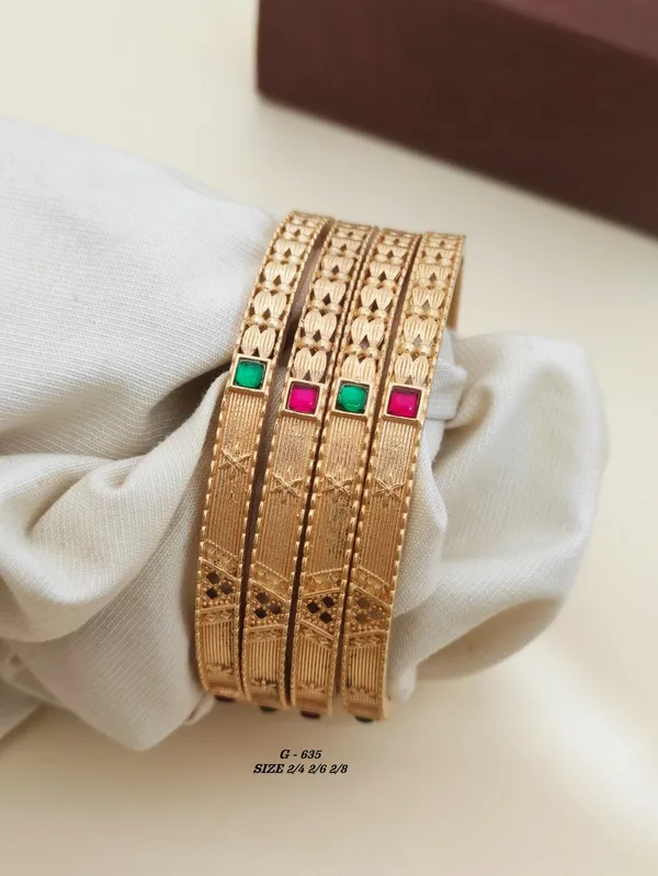 Textured_Bangles_With_Green_And_Pink_Stone_Accents