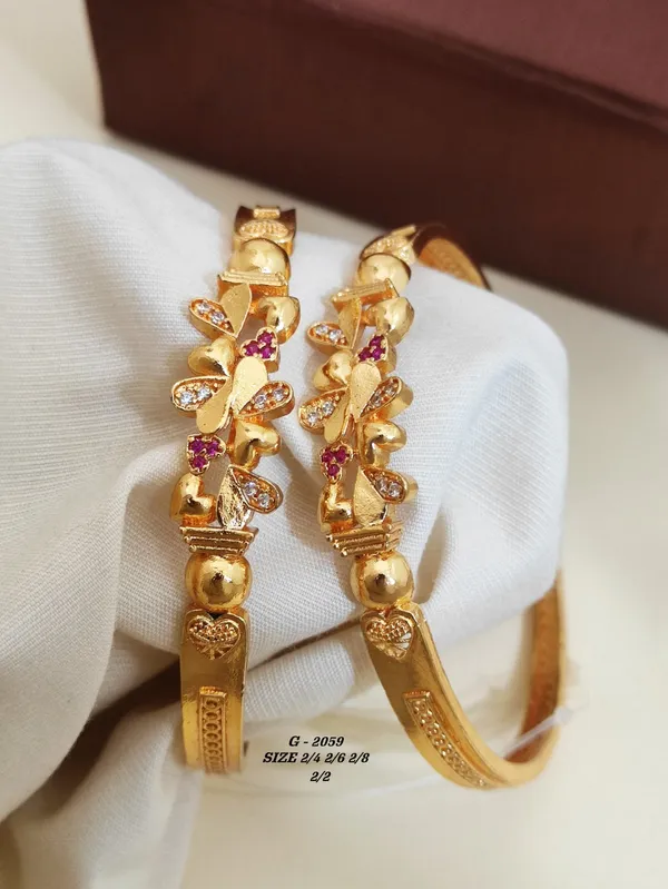 Floral_Design_Bangles_With_Pink_And_White_Stones