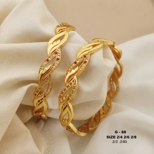 Twisted_Design_Bangles_With_Stone_Accents_For_Women