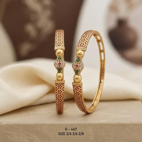 Textured_Bangles_With_Kundan_Embellishments_For_Women