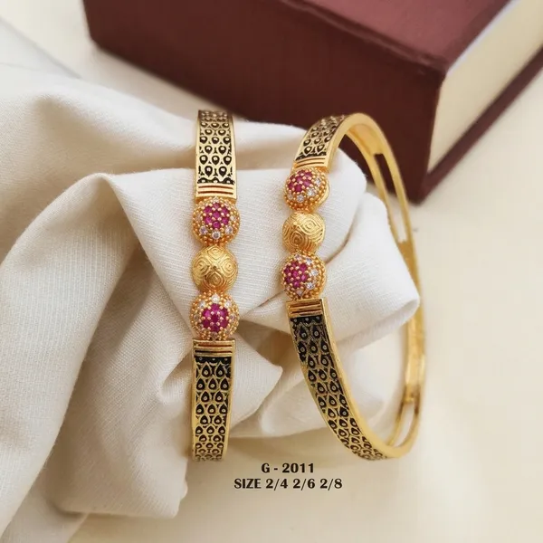 Filigree_Design_Bangles_With_Ruby_And_Zircon_Stones