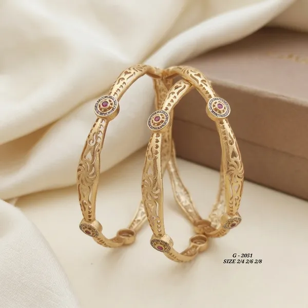 Gold_Engraved_Floral_Pattern_Bangles_With_Ruby_And_Diamond_Accents