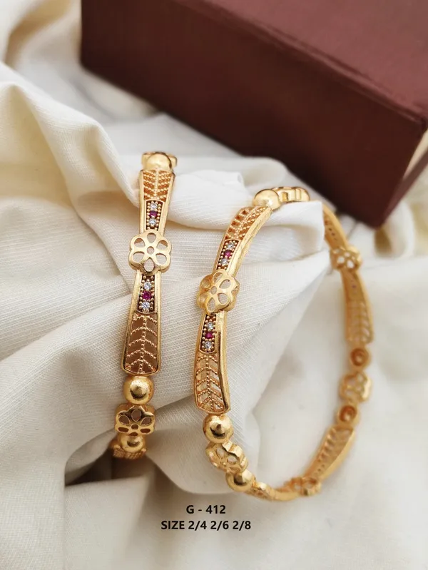 Floral_Design_Bangles_With_Pink_Stones