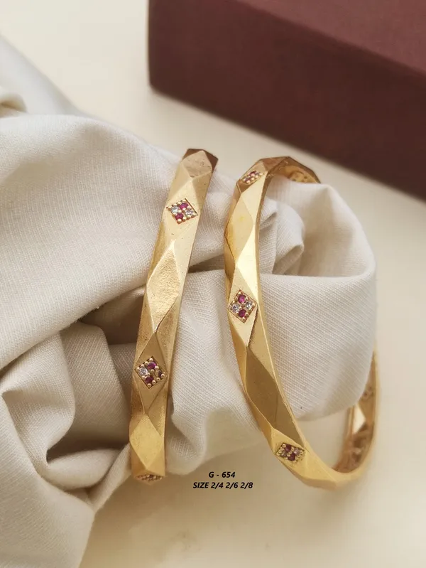 Gold_Twisted_Ruby_Studded_Bangles_For_Women