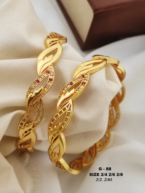 Twisted_Design_Bangles_With_Stone_Accents_For_Women