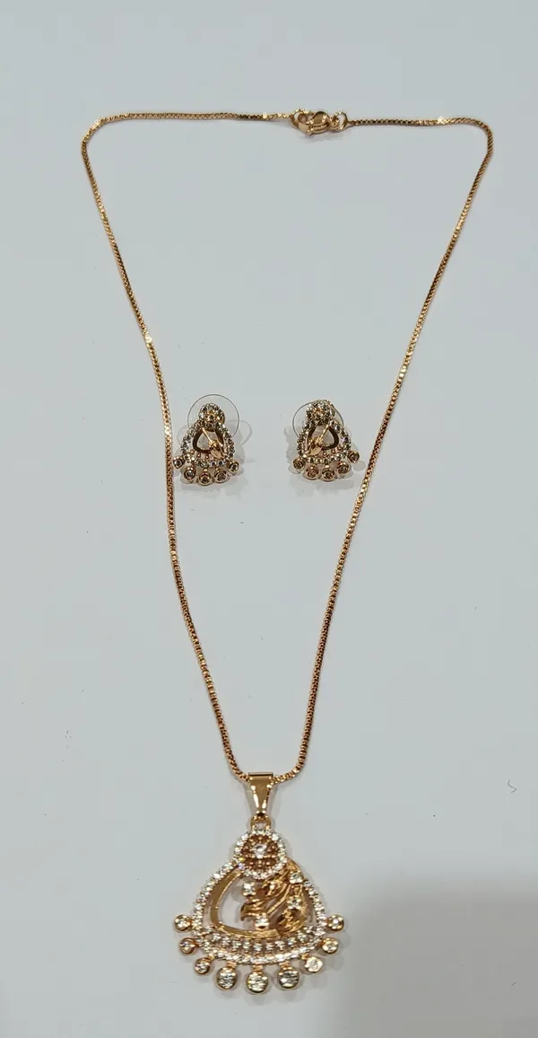 Gold_Tone_Crystal_Studded_Peacock_Pendant_Necklace_With_Matching_Earrings