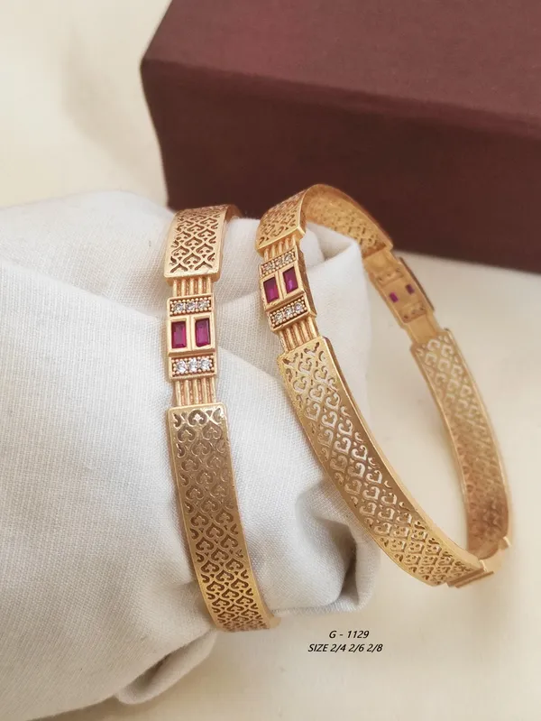 Geometric_Pattern_Bangles_With_Ruby_And_Crystal_Embellishments_For_Women