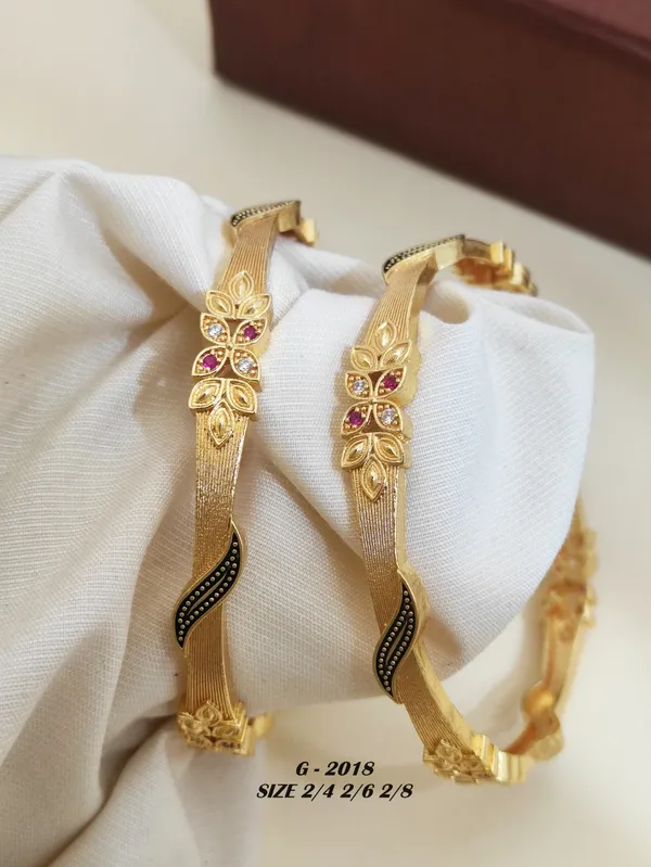 Floral_Design_Bangles_With_Pink_And_Black_Stones