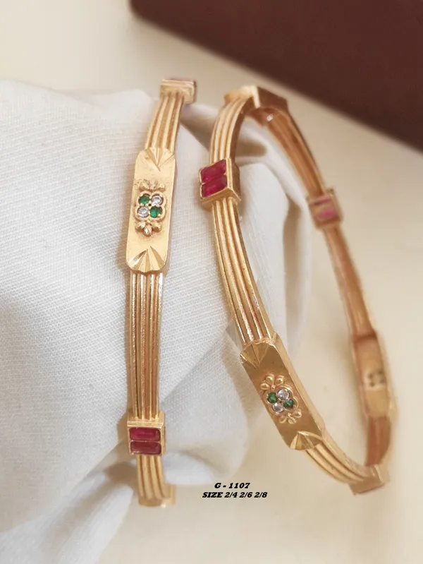 Floral_Design_Bangles_With_Ruby_And_Emerald_Stones