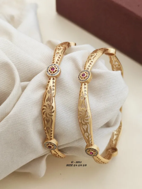 Gold_Engraved_Floral_Pattern_Bangles_With_Ruby_And_Diamond_Accents