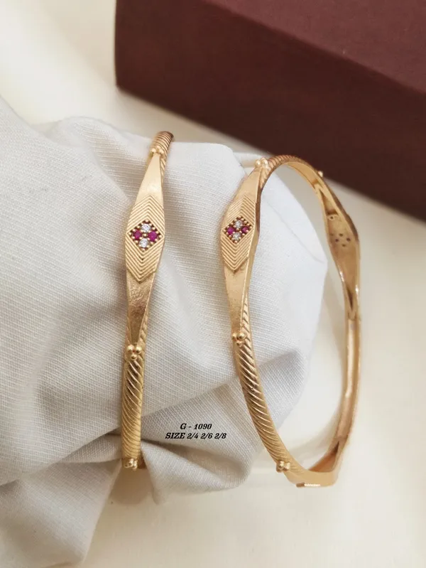 Textured_Bangles_With_Pink_Stone_Embellishments