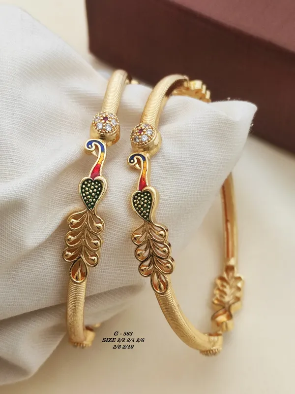 Gold_Peacock_Design_Bangles_With_Enamel_And_Stone_Work