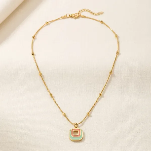 Gold_Plated_Geometric_Pendant_Necklace_With_Green_And_Pink_Enamel