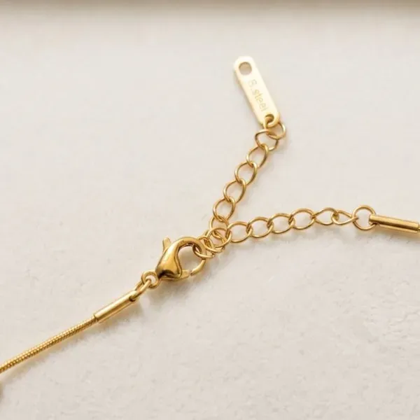 Gold_Toned_Clover_Charm_Snake_Chain_Necklace