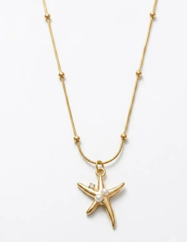 Gold_Tone_Starfish_Pendant_Necklace_With_Crystals