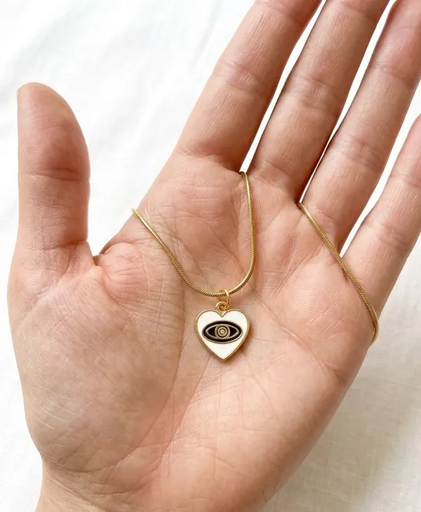 Gold_Tone_Heart_Pendant_Necklace_With_Eye_Design