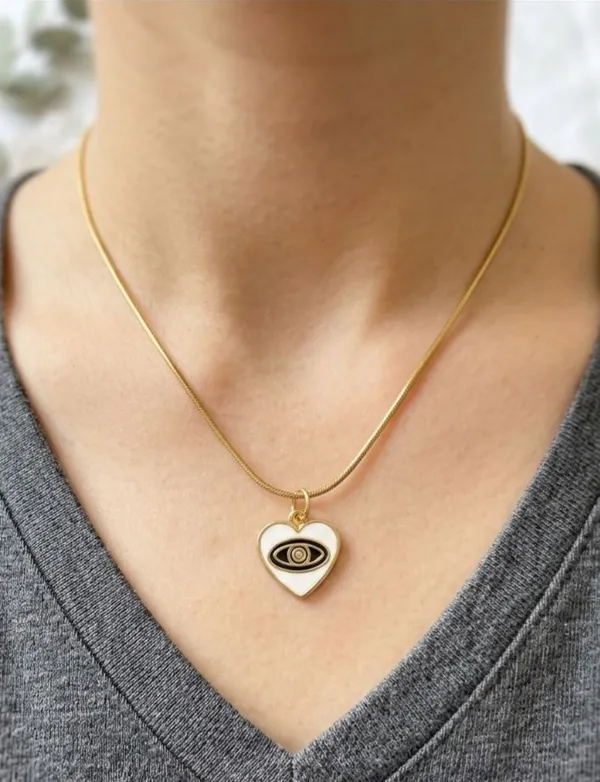 Gold_Tone_Heart_Pendant_Necklace_With_Eye_Design