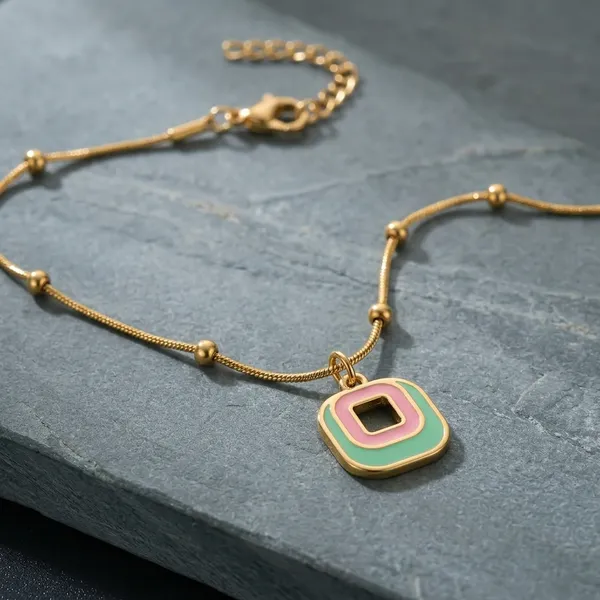 Gold_Plated_Geometric_Pendant_Necklace_With_Green_And_Pink_Enamel