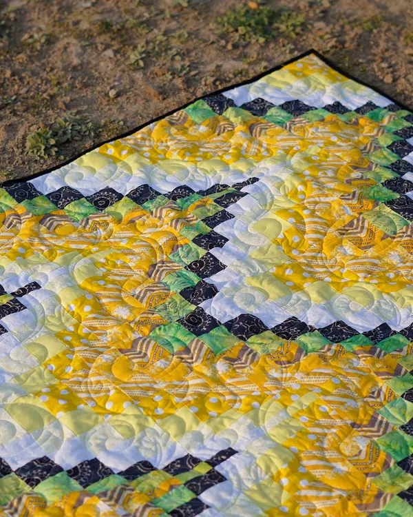 Sun_Kissed_Petal_Vine_Patchwork_Bed_Quilt