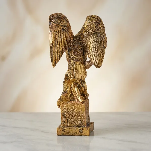 Golden_Brass_Angel_Figurine_With_Ornate_Detailing