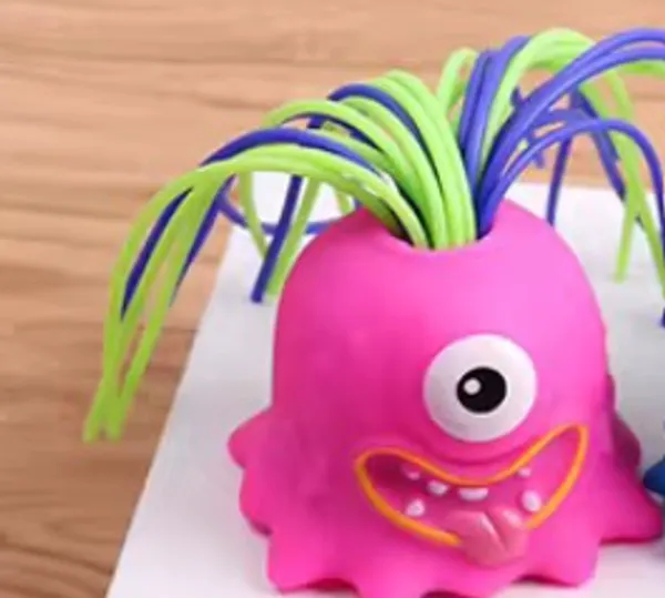 Pink_Monster_Pull-Hair_Interactive_Rubber_Squeeze_Toy