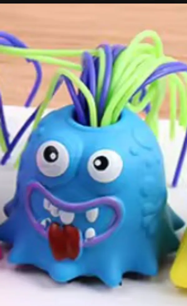 Blue_Monster_Soft_Rubber_Squeeze_Toy_With_Green_Hair