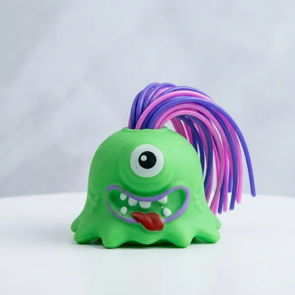 Green_Monster_Soft_Rubber_Squeeze_Toy_With_Colorful_Hair