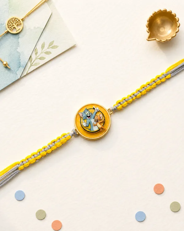 Radha_Krishna_Enamel_Rakhi_With_Yellow_And_Silver_Thread_(Pack_Of_3)