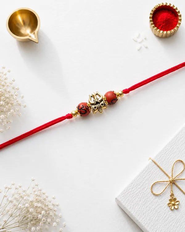 Red_Thread_Gold_Beaded_Rakhi_For_Brother_(Pack_Of_9)