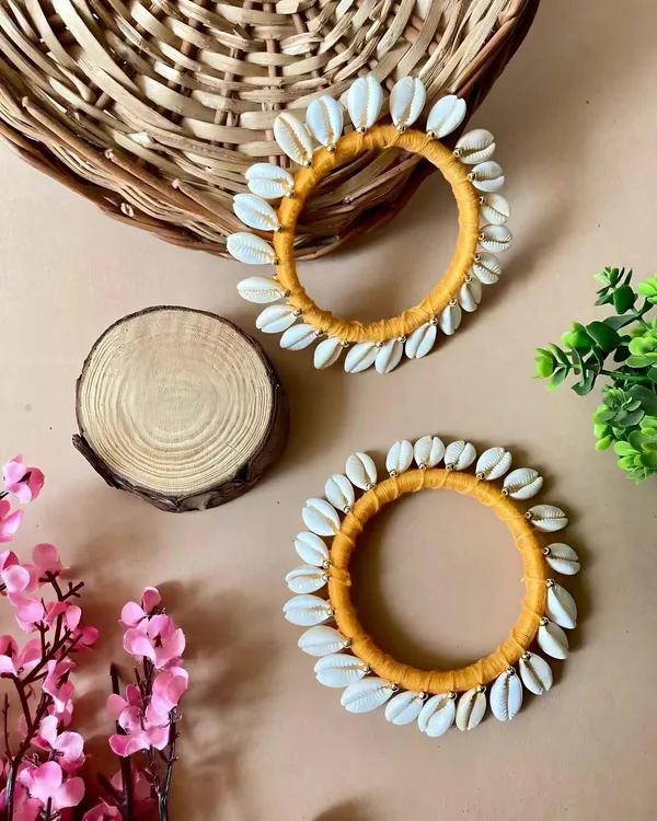 Yellow_Fabric_Cowrie_Shell_Handcrafted_Bangles_For_Women_Set_Of_2