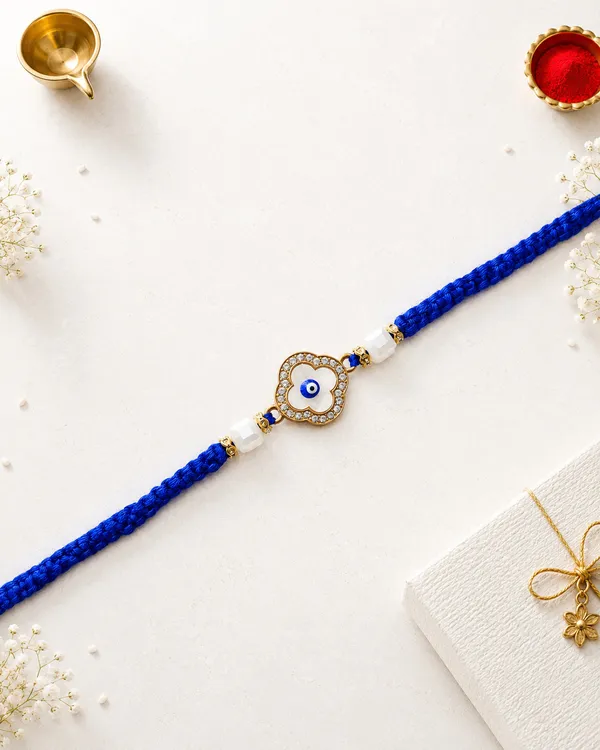 Blue_Braided_Rakhi_With_Evil_Eye_And_Gold_Detailing_(Pack_Of_5)