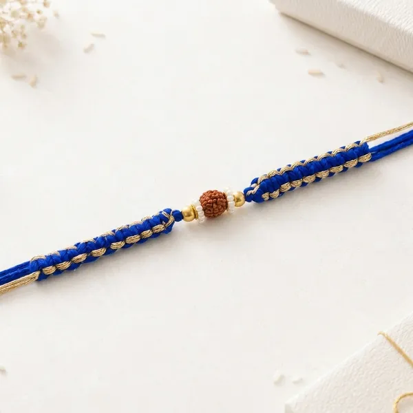Blue_Rakhi_With_Rudraksha_And_Golden_Beads_(Pack_Of_8)
