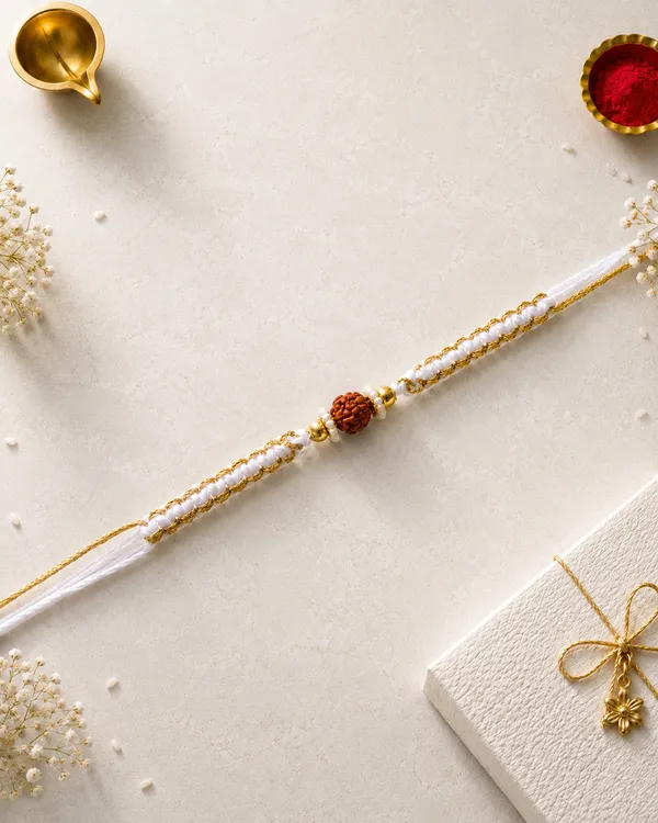 Handcrafted_Rakhi_With_Rudraksha_Bead_And_Pearl_Accents_(Pack_Of_7)
