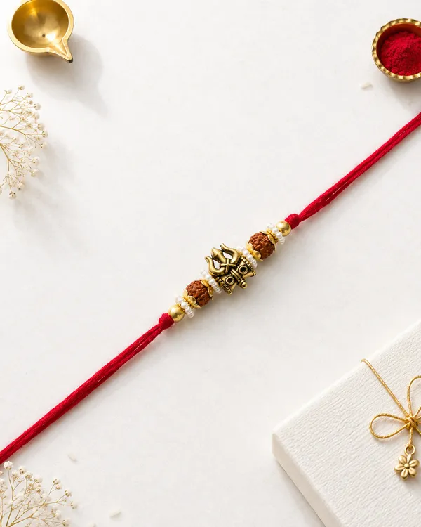 Golden_Rudraksha_Om_Rakhi_With_Red_Thread_(Pack_Of_7)