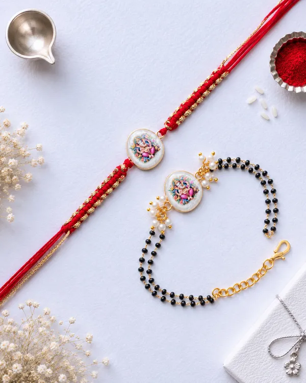 Red_Thread_Rakhi_Set_With_Black_Beaded_Mangalsutra_For_Bhai_Bhabhi_(Pack_Of_2)
