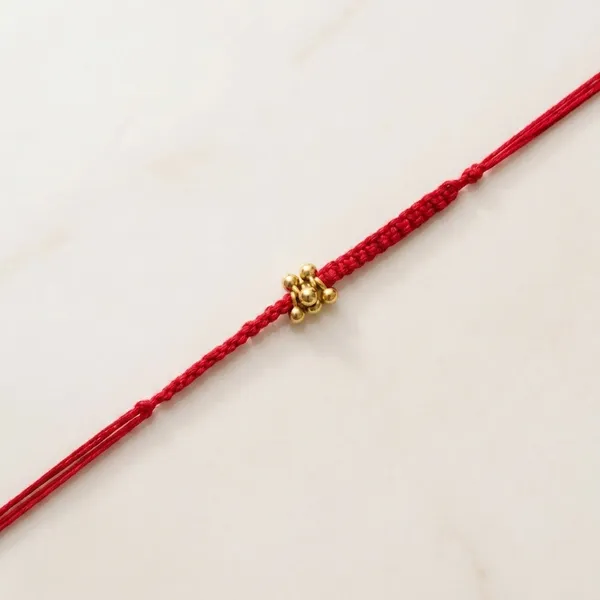Gold_Rakhi_With_Red_Thread_For_Raksha_Bandhan_(Pack_Of_11)