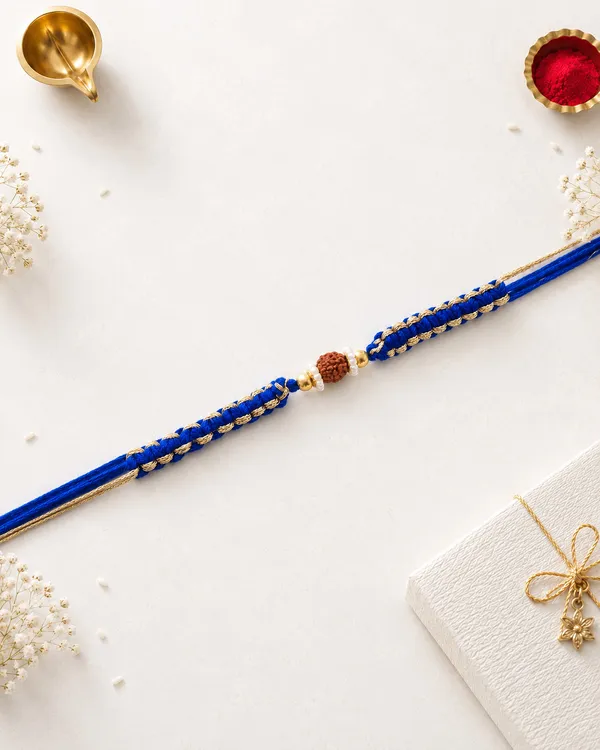 Blue_Rakhi_With_Rudraksha_And_Golden_Beads_(Pack_Of_8)