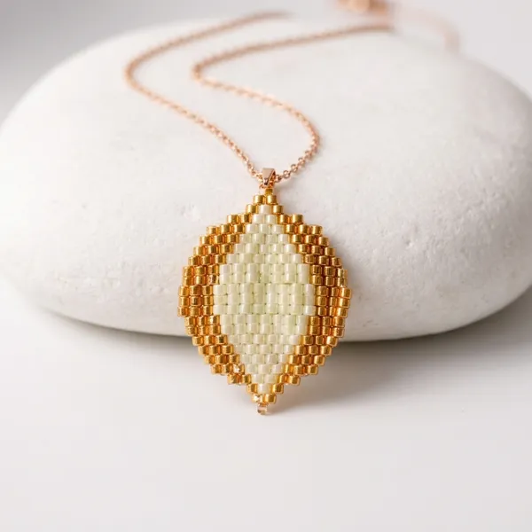 Gold_Ivory_Beaded_Leaf_Pendant_Necklace_And_Earrings_Set_For_Women