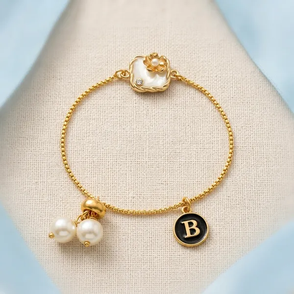 Gold_Plated_Blue_Thread_Pearl_Flower_Rakhi_Bracelet_Set_(Pack_Of_2)