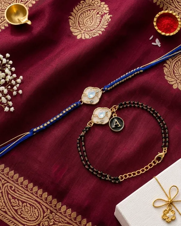 Gold_Mangalsutra_Bracelet_Rakhi_Set_With_Personalized_Charm_(Pac_Of_2)