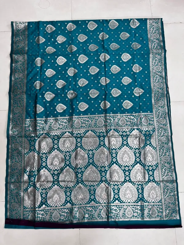 Teal_Blue_Silk_And_Polyester_Saree_With_Blouse_Piece_For_Women