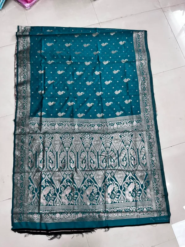Teal_Silk_And_Polyester_Saree_With_Blouse_Piece_For_Women