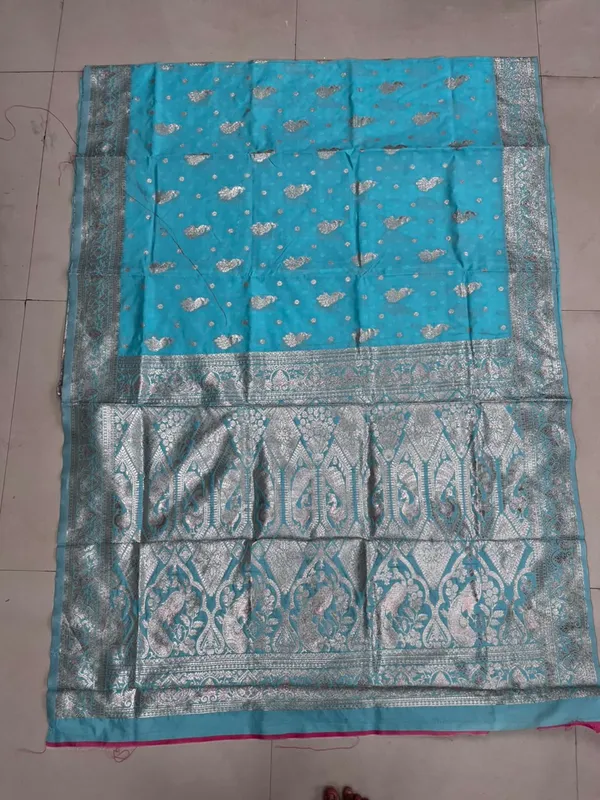 Sky_Blue_Silk_And_Polyester_Saree_With_Blouse_Piece_For_Women