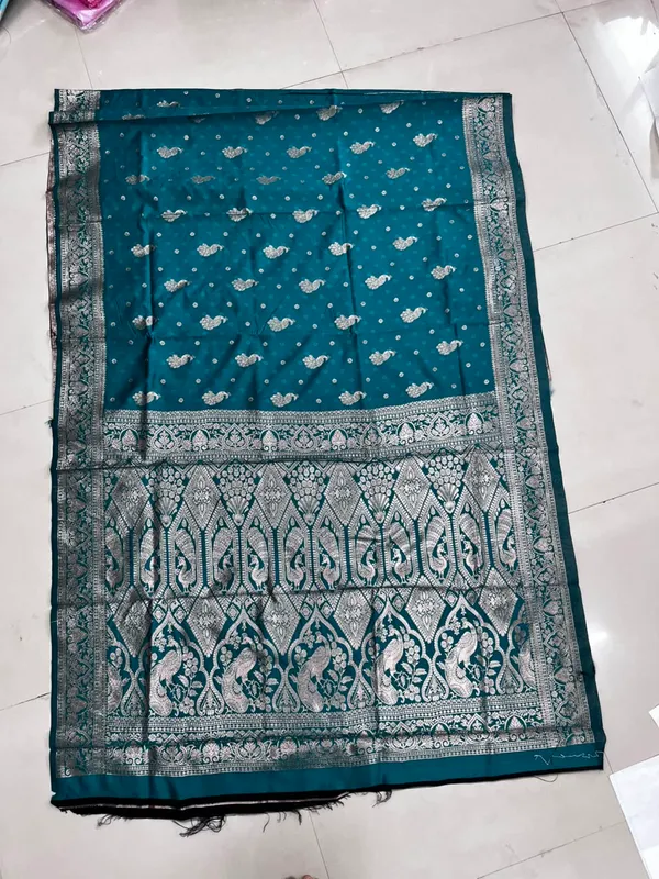 Teal_Blue_Silk_And_Polyester_Saree_With_Blouse_Piece_For_Women
