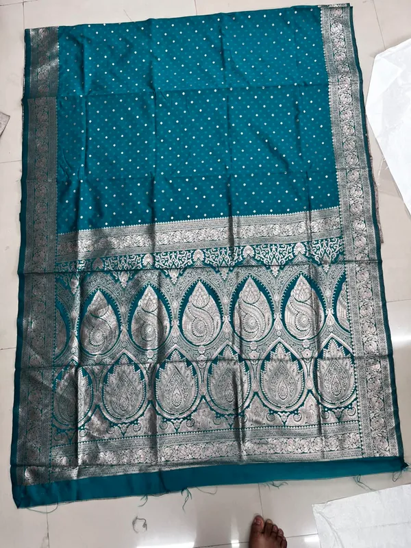 Teal_Blue_Silk_And_Polyester_Saree_With_Blouse_Piece_For_Women