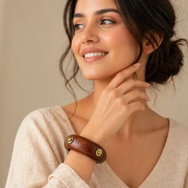 Elegant_Handcrafted_Wooden_Bangle_with_Brass_Stud_Accents