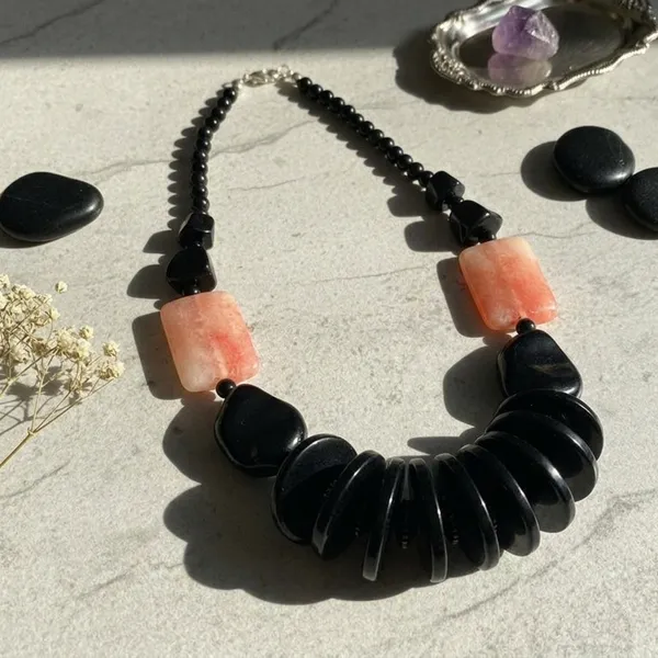Black_Beaded_Necklace_With_Red-Orange_Stone_Accents_Dori_Necklace