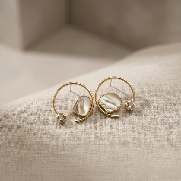 Highlighting_The_Golden_Radial_Design_And_The_Unique_Stone_In_Between_Feature_Metal_Drops_And_Danglers