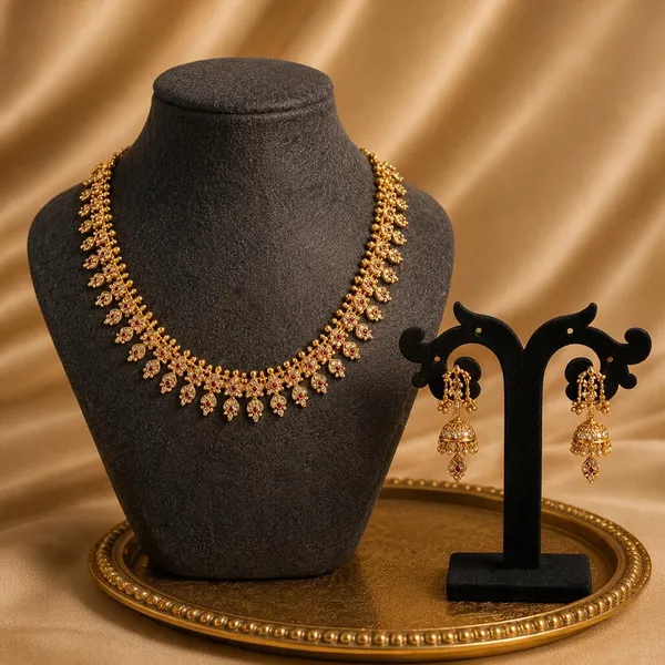 Antique_Gold-Tone_Mango_Motif_Necklace_with_Goddess_Lakshmi_Drop_Earrings