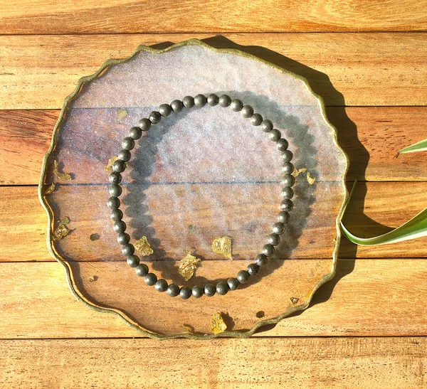 Raw_Pyrite_Bracelet_With_Free_Selenite_Tumble